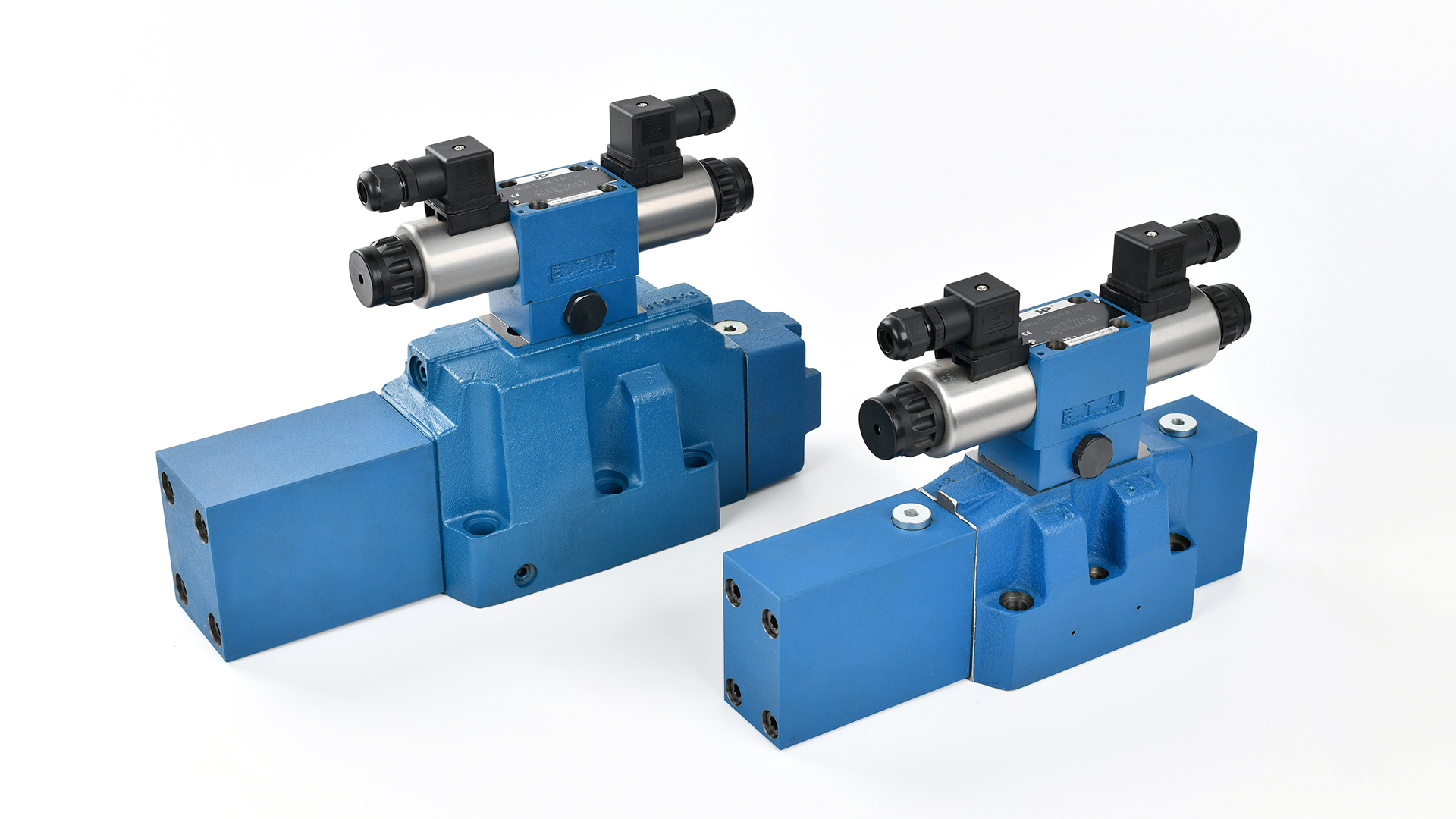 比例换向阀是如何控制流体流向和压力的？